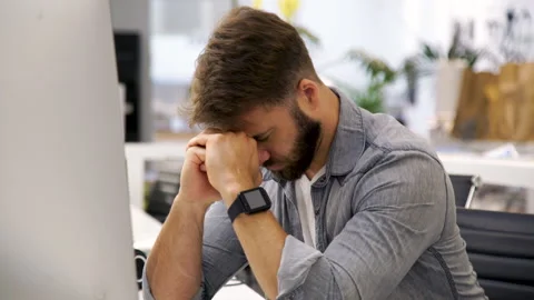 Mid-shot side view of young manager getting bad news while having a remote video Stock Footage 277955126