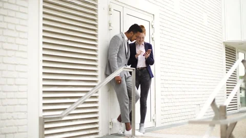 Mid-shot side view of young woman holding a digital tablet while checking text Stock Footage 278011024