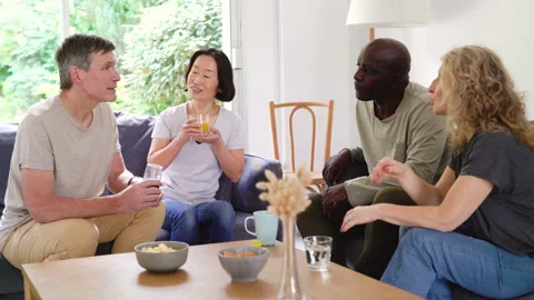 Mid-shot view of diverse group of coworkers sharing ideas for company project Stock Footage 278045637