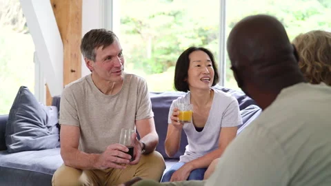 Mid-shot view of diverse group of coworkers sharing ideas for company project Stock Footage 278045863
