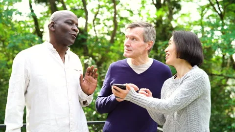 Mid-shot view of diverse group of coworkers sharing ideas for company project Stock Footage 278047407