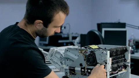 Mid shot Worker repairs electronic stuff Stock Footage 65511449