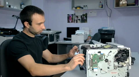 Mid shot Worker repairs electronic stuff Stock Footage 65511555