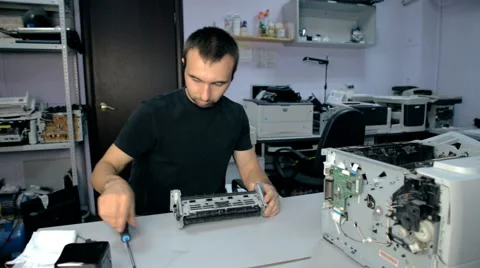 Mid shot Worker repairs electronic stuff Stock Footage 65511655