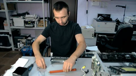 Mid shot Worker repairs electronic stuff Stock Footage 65511722