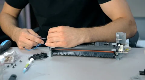 Mid shot Worker repairs electronic stuff Stock Footage 65512285