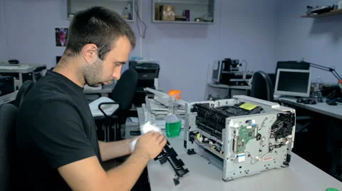 Mid shot Worker repairs electronic stuff Stock Footage 65512636