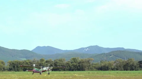 Mid sized air-plane taking off from the airfield Stock Footage 140269941