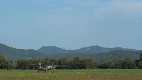 Mid sized air plane taking off the airfield Stock Footage 140270007