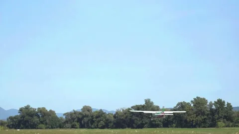 Mid sized air-plane taking off on the airfield Stock Footage 140270157