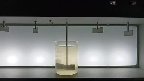 Mid-Stage Second Phase Slow Mixing in Jar Test - Macro-Floc Formation Video stock 326168194