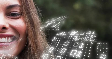 Mid woman framing face as binary grid forming and rotating, fueling smile in Stock Footage 319679270