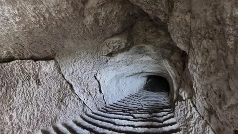 Midas City, Going down stairs through the old cistern. Phrygian Valley (2/3) Vídeo Stock 306551825