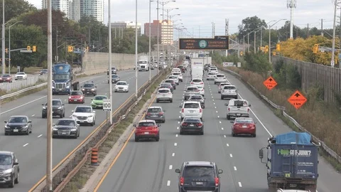 Midday traffic on busy highway Stock Footage 117199065