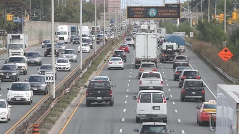 Midday traffic on busy highway Stock Footage 117201535