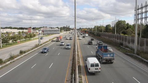 Midday traffic on busy highway Stock Footage 117201796