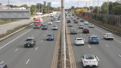 Midday traffic on busy highway Stock Footage 117201875
