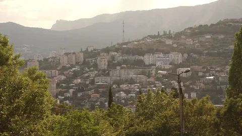 Midday in Yalta with view on TV tower and Ai-Petri Mountain Stock Footage 69220201