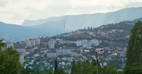 Midday in Yalta with view on TV tower and Ai-Petri Mountain Stock Footage 70972340