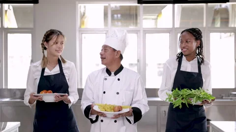 Middle age chef man acting head or master teaching multiethnic staff traine.. Stock Footage 246722331
