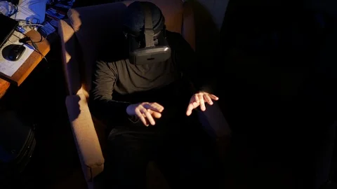 Middle age hacker works with net via virtual reality interface and develops Video stock 89975745