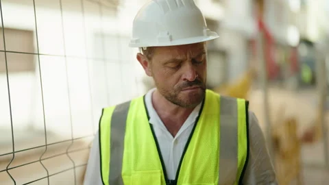Middle age man architect talking on smartphone with worried expression at s.. Video stock 223726299