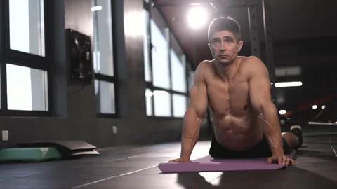 Middle Age Man Doing Yoga Sphinx Pose Stretching Lying On Stomach Stock Footage 201406402