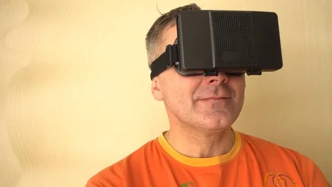 Middle age Man Experiencing Virtual Reality - 360 Movie VR Video 3D - New Stock Footage 72070765