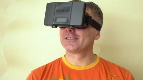 Middle age Man Experiencing Virtual Reality - 360 Movie VR Video 3D - New Stock Footage 72076374