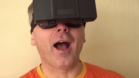 Middle age Man Experiencing Virtual Reality - 360 Movie VR Video 3D - New Stock Footage 72076608