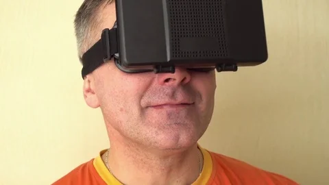 Middle age Man Experiencing Virtual Reality - 360 Movie VR Video 3D - New Stock Footage 72076688