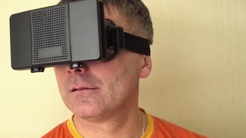 Middle age Man Experiencing Virtual Reality - 360 Movie VR Video 3D - New Stock Footage 72076816