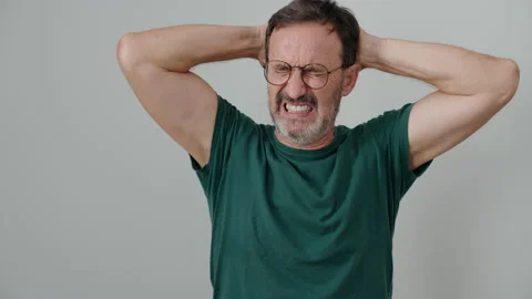 Middle age man stressed standing over isolated white background Stock Footage 205530377
