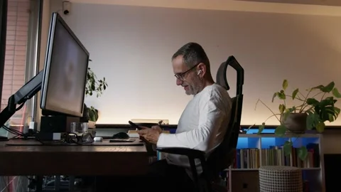 Middle age man working from home. Stock Footage 220440492