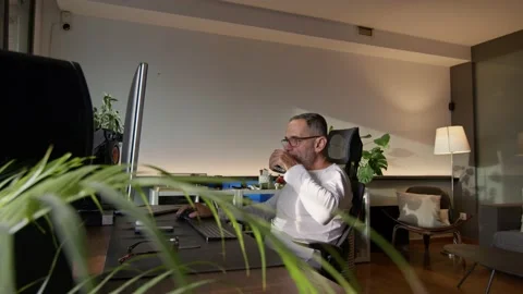 Middle age man working from home. Stock-Footage 220450551