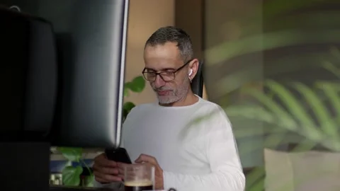 Middle age man working from home. Video stock 220465111