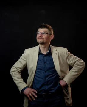 Middle aged actor in light jacket performs dreaming guy Stock Photos