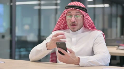 Middle Aged Arab Man doing Video Call on Smartphone in Office Video stock 152524504