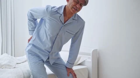 Middle aged asian man having back ache. Stock Footage 153500105
