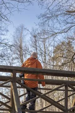 Middle aged bald man with camera Stock Photos