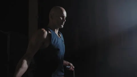 A Middle aged boxer rope jumping Stock Footage 258237425