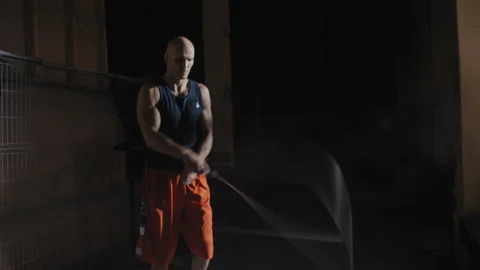 Middle aged boxer rope jumping in the gym Stock Footage 258239242