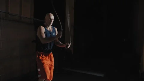 Middle aged boxer rope jumping Stock Footage 258240552