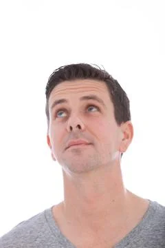 Middle-aged caucasian blue eyed man looking up Stock Photos