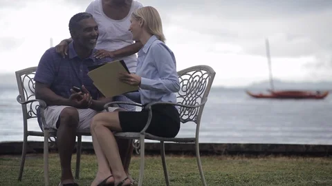 Middle-aged couple being interviewed by the sea. 스톡 동영상 88369638