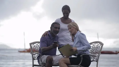 Middle-aged couple being interviewed by the sea. Stock Footage 88369650