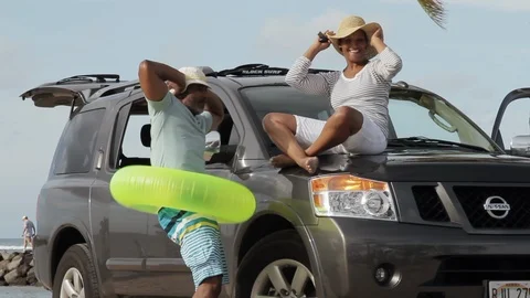 Middle-aged couple dancing by a car. 스톡 동영상 88370510
