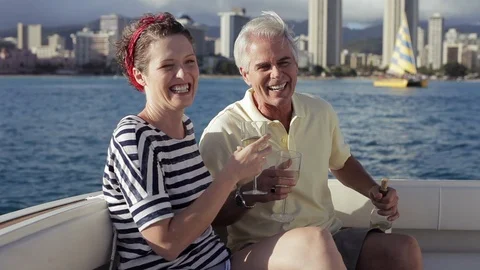 Middle-aged couple drinking wine on a boat. 스톡 동영상 88370728