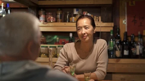 Middle aged couple drinking wine at home 스톡 동영상 98949565