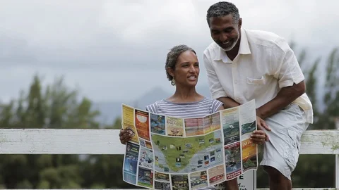 Middle-aged couple reading a map. Stock Footage 88370269